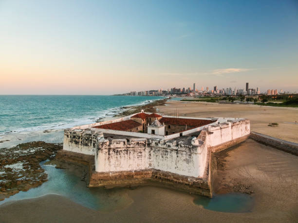 Aerial view of Forte dos Reis Magos (Fort) and skyline of Natal city on background stock photo