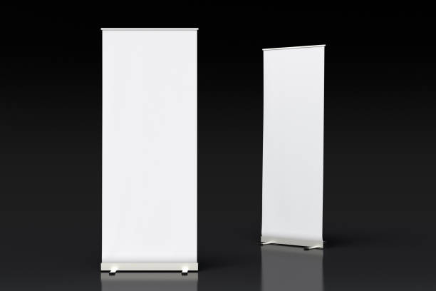 istock blank roll up banner display stands on black 1015414346