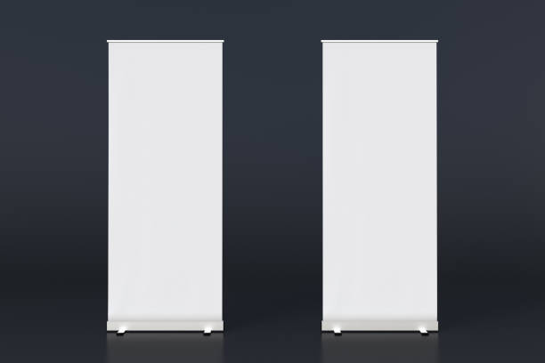 istock blank roll up banner display stands on black 1015414594