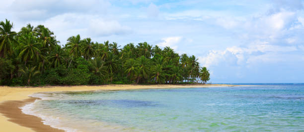 istock Caribbean sea and clouds sky . Travel background 1015425612
