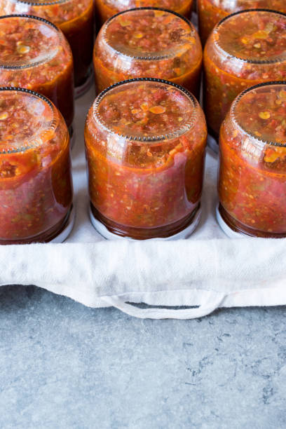 istock Homemade Preserved Tomato Paste Sauce in Glass Jar. 1015430524
