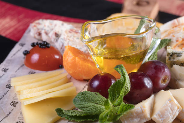 istock Cheese snack. Assorted hard and soft cheeses and cheeses with mold. 1015434228