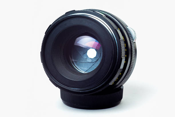 istock Camera lens close-up isolated on white background 1015434446