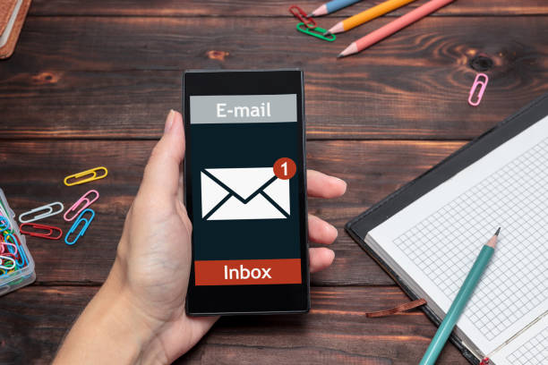 istock The woman received an e-mail online on a mobile. Message online icon. 1015436740