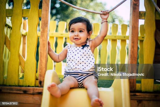 The Baby Is Playing Outside Stock Photo - Download Image Now - Baby - Human Age, Toddler, Playground