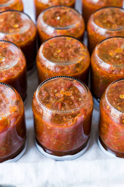 istock Homemade Preserved Tomato Paste Sauce in Glass Jar. 1015437650