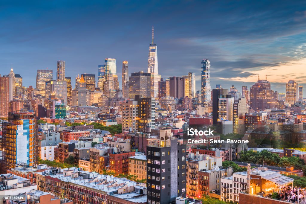 Lower Manhattan New York City New York, New York, USA financial district skyline from the Lower East Side at dusk. New York City Stock Photo