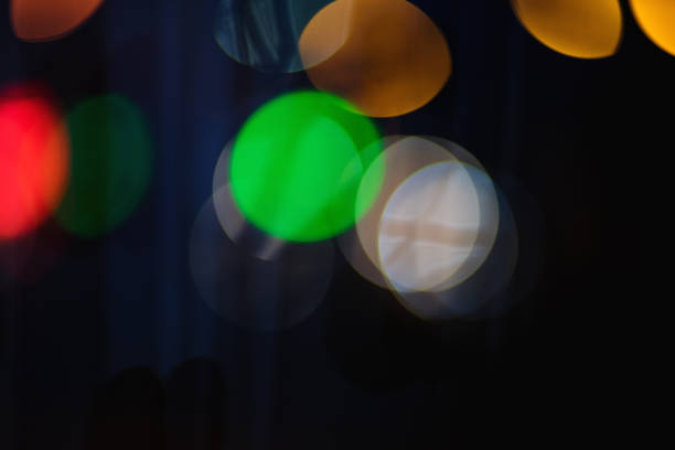 istock Close-Up Defocused Traffic Street Lights At Night 1015441874