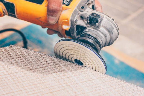 istock Professional skilled work on the installation of tiles 1015441988