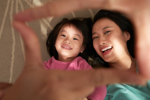 istock Cheerful ethnic woman with daughter 1015443476