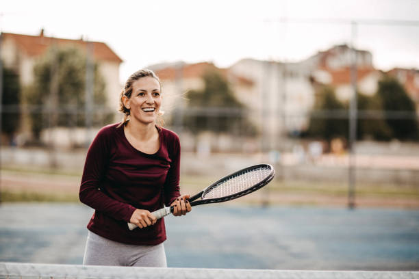 Beautiful tennis player Beautiful tennis player center athlete stock pictures, royalty-free photos & images