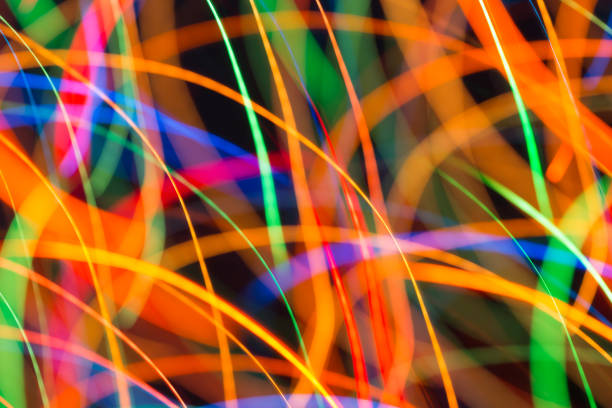 istock Abstract picture of bright colored dynamic lights 1015444104