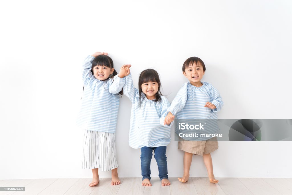 kindergarten child playing Child Stock Photo