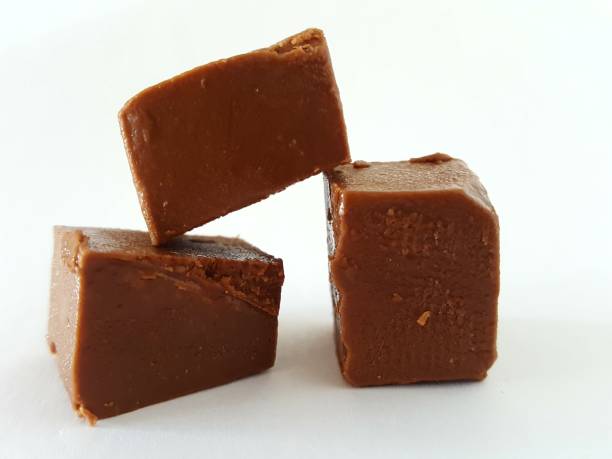 istock Dark chocolate nougat on white background 1015447922
