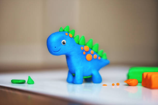 children's creativity. figurine of plasticine. toy animal dinosaur children's creativity. figurine of plasticine childs play clay stock pictures, royalty-free photos & images