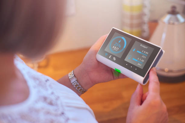 istock Homeowner checking energy costs on smart meter 1015450748