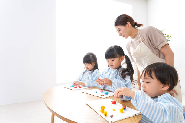 istock Children's nurse and kindergarten child 1015451278