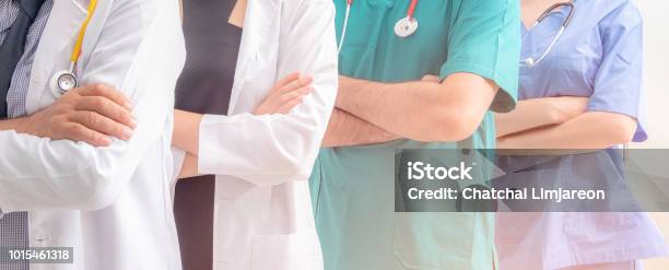 Doctors And Nurses With Uniform And Stethoscope Coordinate Hands Concept Teamwork In Hospital For Success Work And Trust In Team Stock Photo - Download Image Now