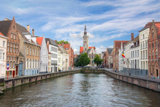 istock Bruges canals and Van Eyck square, Belgium 1015466100