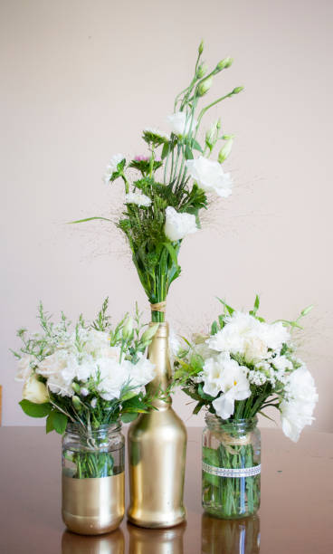 istock Vintage flowers in jars and bottle 1015470852