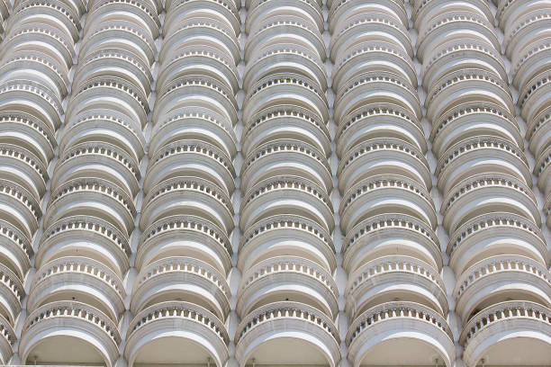 The curved white building balcony
