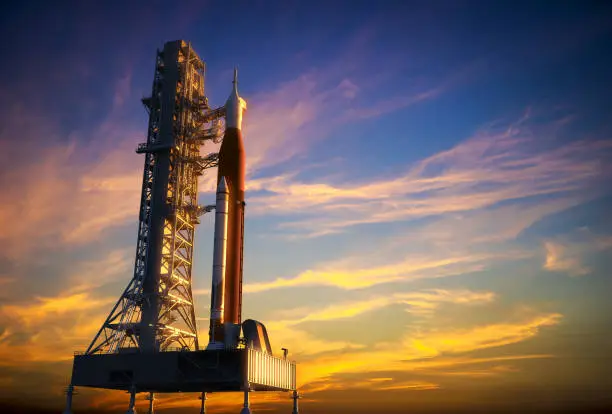 Space Launch System On Launchpad Over Background Of Red Clouds. 3D Illustration. NASA Images Not Used.