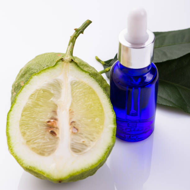 istock Lemon essential oil on a white background 1015490970