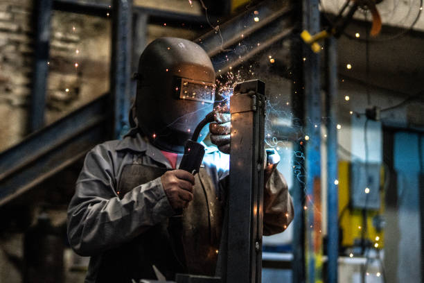 istock Industrial Worker welding steel 1015499458