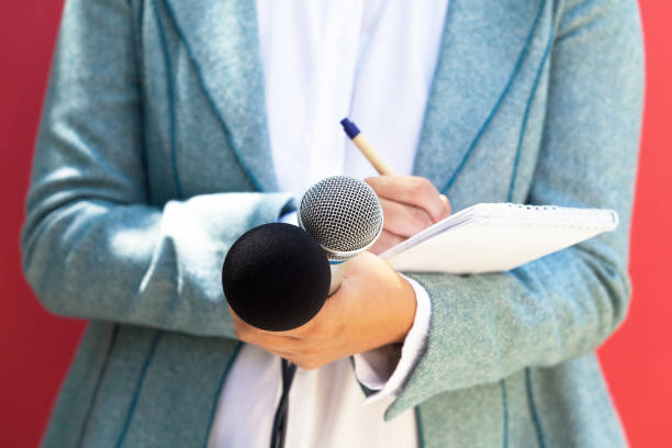 istock Journalist at news conference 1015507784