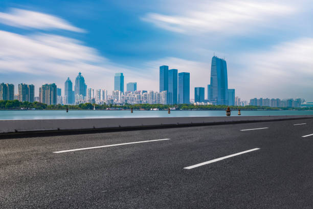 istock City Square Road Pavement and Suzhou Landmark Building Complex 1015509480