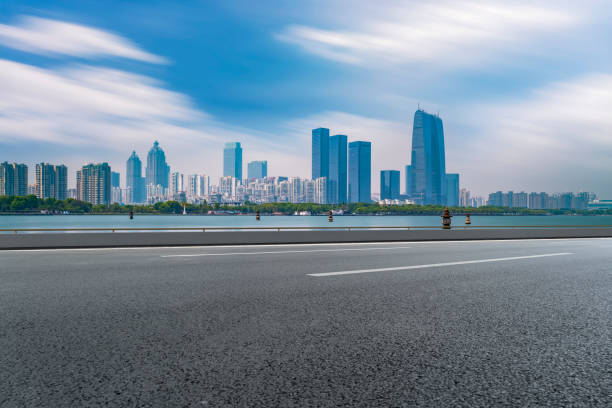 istock City Square Road Pavement and Suzhou Landmark Building Complex 1015512116