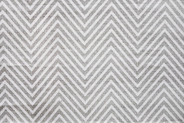 tapis de chevron en blanc et gris - textile pattern photos et images de collection