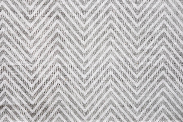 tappeto chevron in bianco e grigio - textile print foto e immagini stock