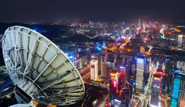 istock City building and satellite signal receiver 1015514112