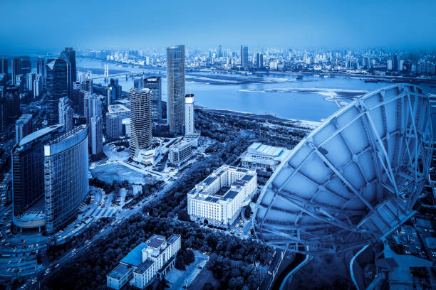 istock Satellite signal receiver over the city 1015518984