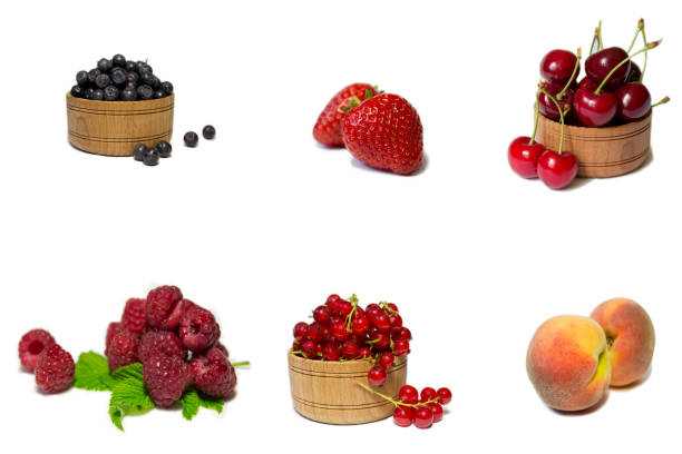 set of berries in wooden cups isolated