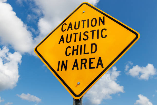 istock Yellow Caution Autistic Child In Area traffic sign I 1015540864