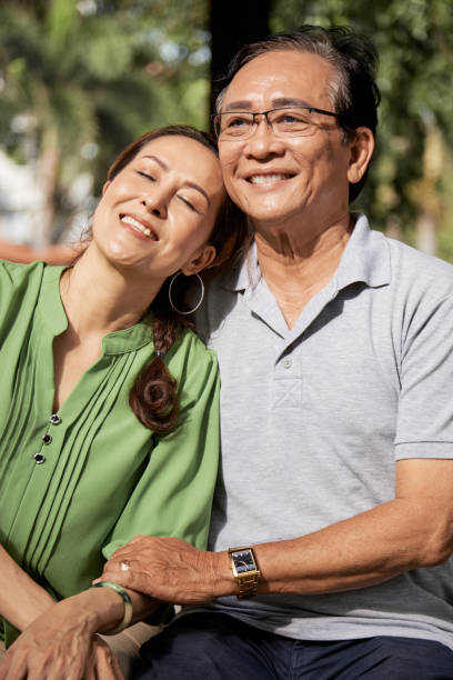 istock Couple resting in summer park 1015540934