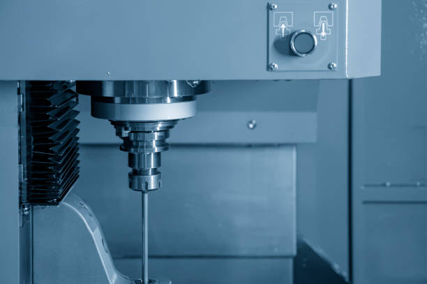 istock The vertical CNC gun-drill machine drilling the mold part . 1015541410