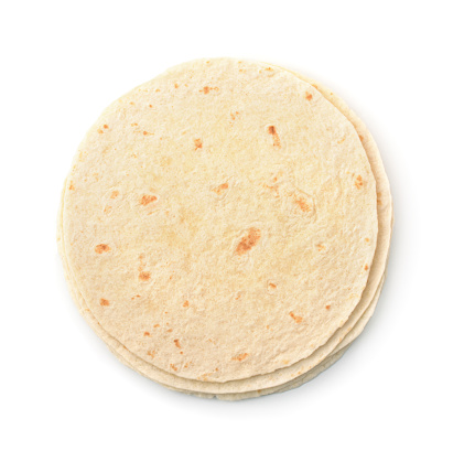 Top view of wheat flat bread  isolated on white