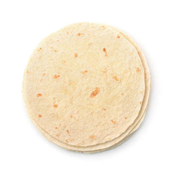 Flat bread Top view of wheat flat bread  isolated on white tortilla flatbread stock pictures, royalty-free photos & images