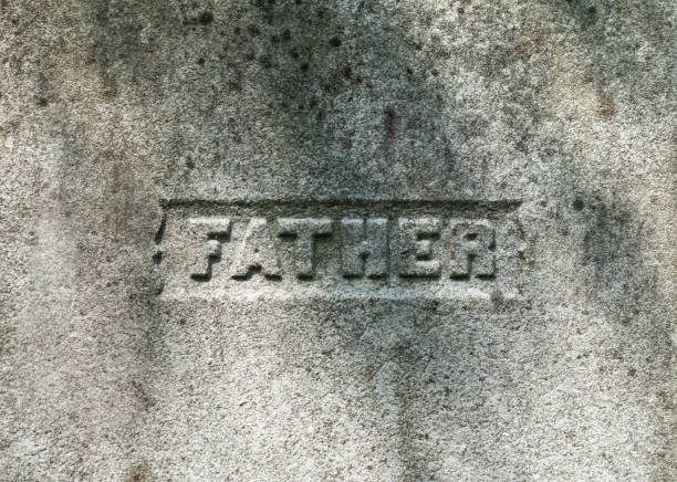 istock Father Inscription on Stone 1015561576