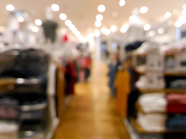 istock Blurred colorful clothing shop with bokeh light 1015564740