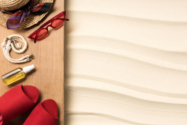 istock flat lay with feminine red accessories for rest on beach on sand 1015577208
