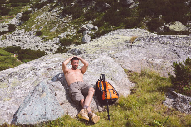 istock Tourist hiking in the mountain 1015577224
