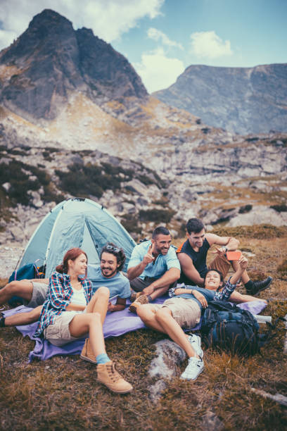 istock Friends camping in the mountain 1015577348