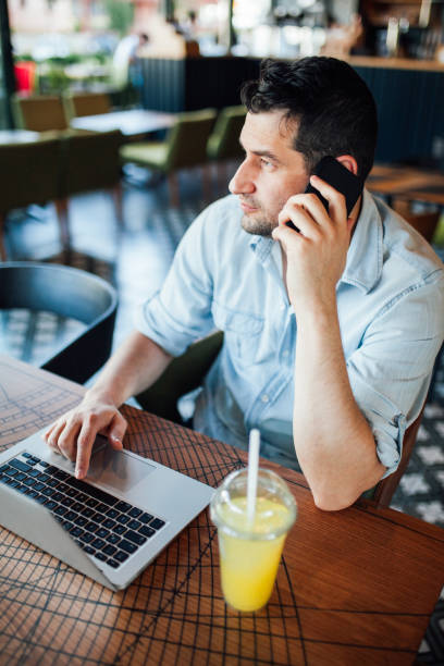 istock Laptop , smartphone and Lemonade in cafe 1015589820