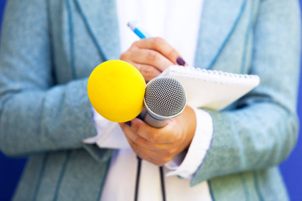 istock Journalist at news conference 1015594826