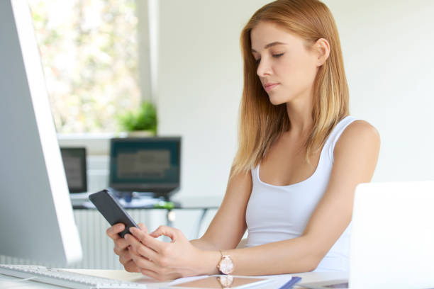 istock Businesswoman getting good news 1015597710