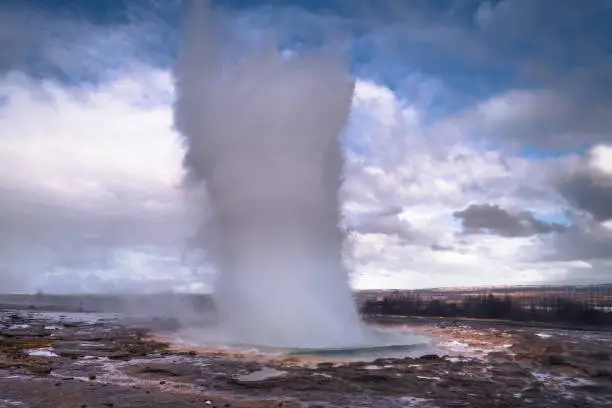 Photo of Geysir - May 03, 2018: A tall geyser eruption at Geysir, Iceland